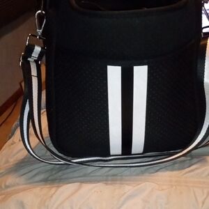 HAUTE SHORE Black Crossbody Bag with White Stripe Accents